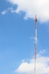 Communication tower on blue sky background