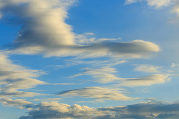 Fototapeta premium Clouds after rain before sunset as a background