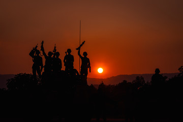 twilight landscape silhouette military and gun