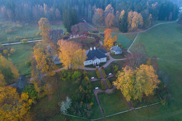 The Mikhailovskoe in October in the early morning (aerial photography). Pushkin Mountains, Russia