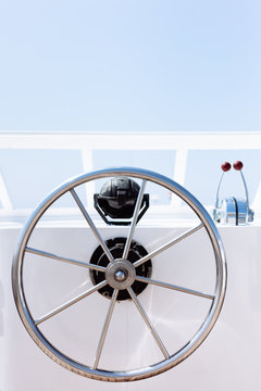 The bridge of the ship with the helm (steering wheel)