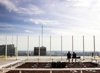 rooftop view people sitting