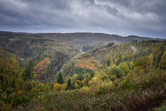 Colorful panorama from the Ourthe valley at autumn time Ardennes Belgium