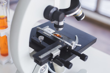Close up of microscope at laboratory. Scientific equipment.