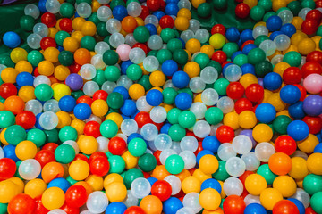 Fototapeta na wymiar A pile of colorful plastic balls
