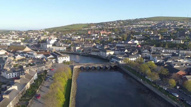 Stunning 4K aerial shot descending over an old Irish town.