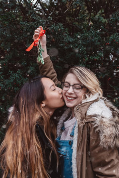Two female friends out on a winter walk
