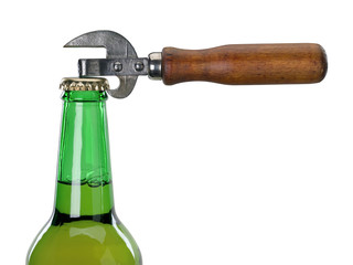 Neck of glass bottle with beer and can opener