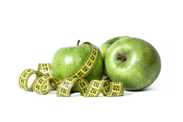 apples and tape measure, concept of diet and health
