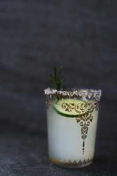 Lime margarita on dark background 