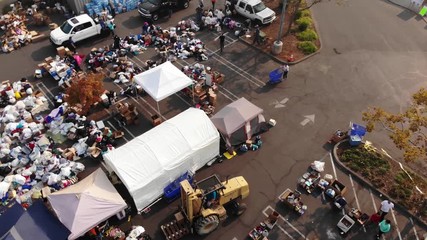Aerial of workers loading donations at Camp Fire distribution center in California