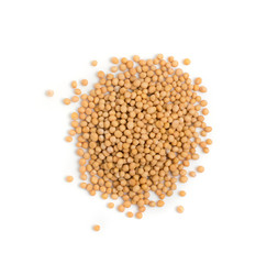 Dry yellow mustard seeds isolated on white background