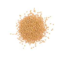 Dry yellow mustard seeds isolated on white background