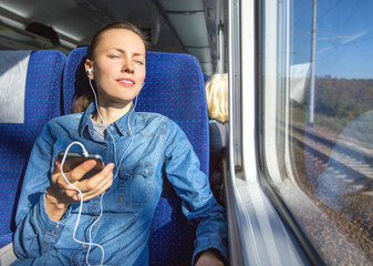 beautiful girl traveling by train