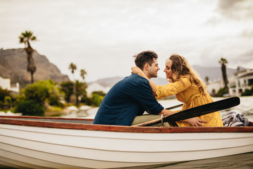 Romantic couple in love on a boat date