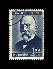 Robert Koch (1843-1910), tuberculosis scientist, explorer, tubercle bacillus discoverer, circa 1960. vintage postal stamp of Romania isolated on black background. 