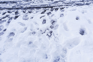 Fototapeta na wymiar Footprint and hands on snow