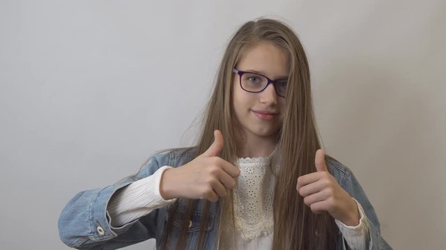 Teen Girl show thumb-up