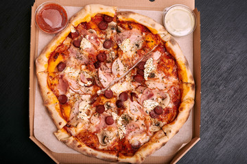 pizza with ham and cheese