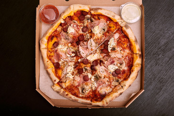pizza with ham and cheese