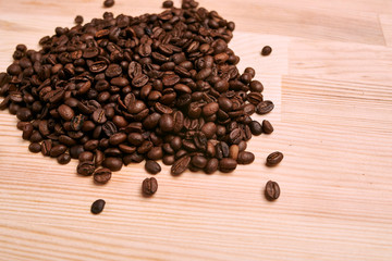 coffee beans on wooden background