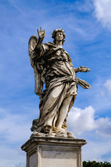 Fototapeta na wymiar Angel with Nails, statue from the Sant'Angelo Bridge in Rome, Italy