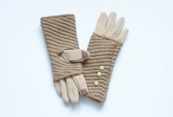 Beige gloves with touchscreen on a white background, double, textile and wool