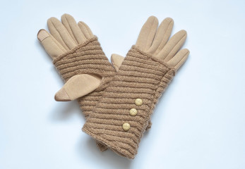 Beige gloves with touchscreen on a white background, double, textile and wool