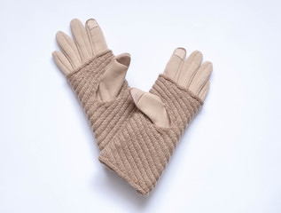 Beige gloves with touchscreen on a white background, double, textile and wool
