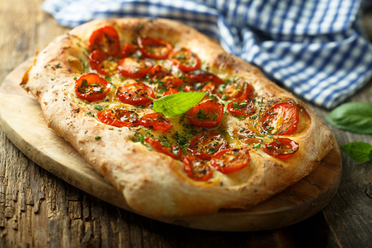 Tomato focaccia with fresh basil