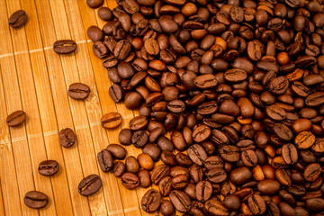 coffee beans on wooden background with copy space for text