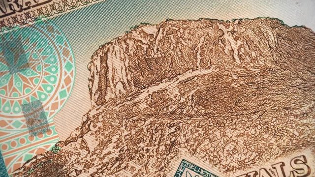 Saudi Arabia 20 riyals banknote rotating, Al Noor Mountain in Mecca, Saudi arabian money close up. 4K UHD video clip