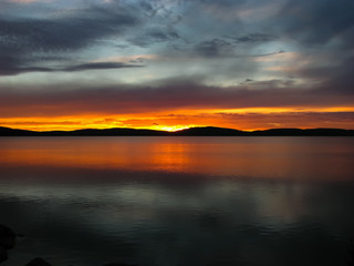 Fototapeta na wymiar Beautiful Sunset Over Water