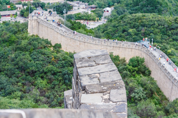Fototapeta na wymiar The Great Wall of China. Old stone wall against the background of mountains