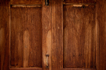 close up brown wooden window of old house.