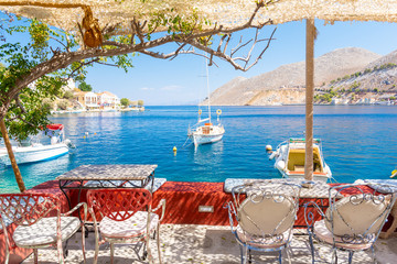 beautiful view on blue sea on Symi island in Greece - obrazy, fototapety, plakaty