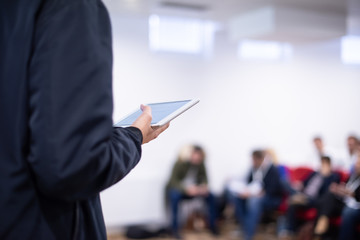 businessman giving presentations at conference room