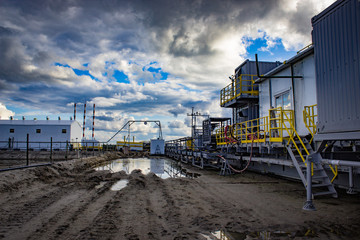 construction site after rain with beautiful clouds