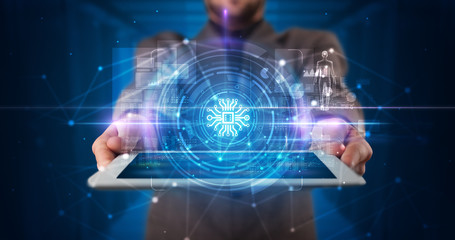 Hand holding tablet with online security and data protection concept
