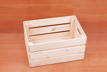 Top view on wooden box on brown floor background