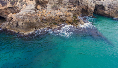 Aerial view of the grottoes in the rocky seashore