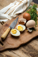 Baked eggs on wooden background