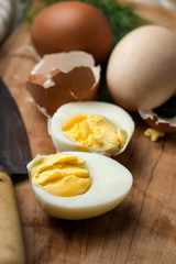 Baked eggs on wooden background