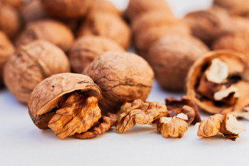 Whole walnuts kernels on white background