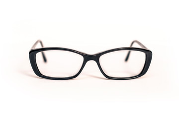 Stylish glasses in a plastic black frame on a white background with dioptres