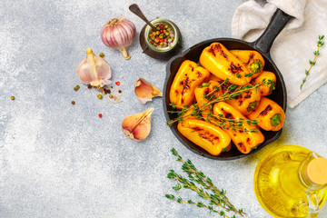 Roasted bell pepper with olive oil, garlic, thyme and spices. Gourmet snack. A side dish to meat...