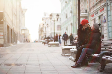 Young couple walking through the winter