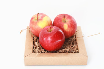 Fresh juicy apples on a white table