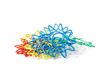 multi colour paper clips isolated on white background
