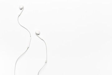 white Earphones isolated on white background